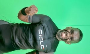 John Eni Kwesi, a trainer on Ciclozone, an indoor cycling app