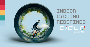 Amination of a man cycling inside a cylindrical road promoting CicloZone, an indoor cycling app